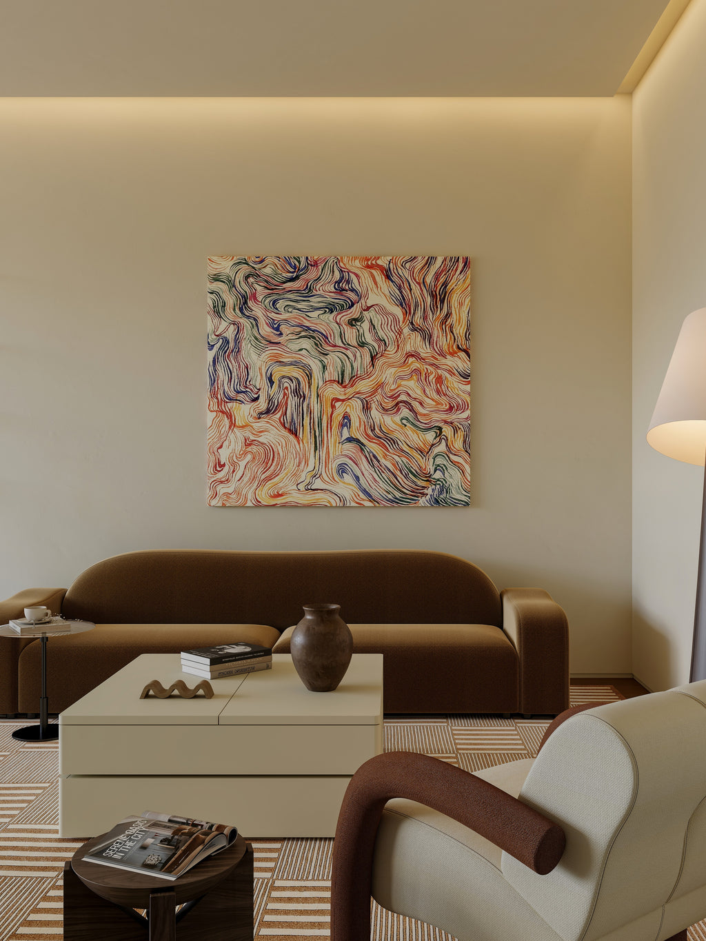 Modern living room with a brown sofa, abstract painting, and decorative items.