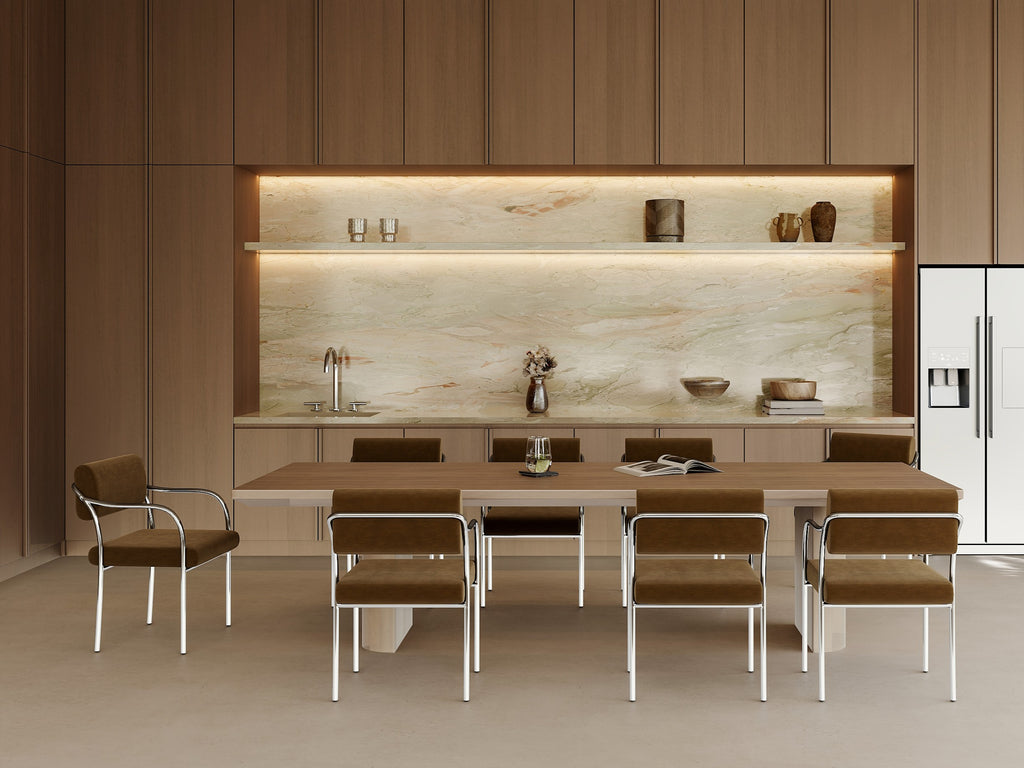 Outline dining chair by formiing. Modern kitchen with wooden dining table and chairs, marble backsplash, and stainless steel appliances. 