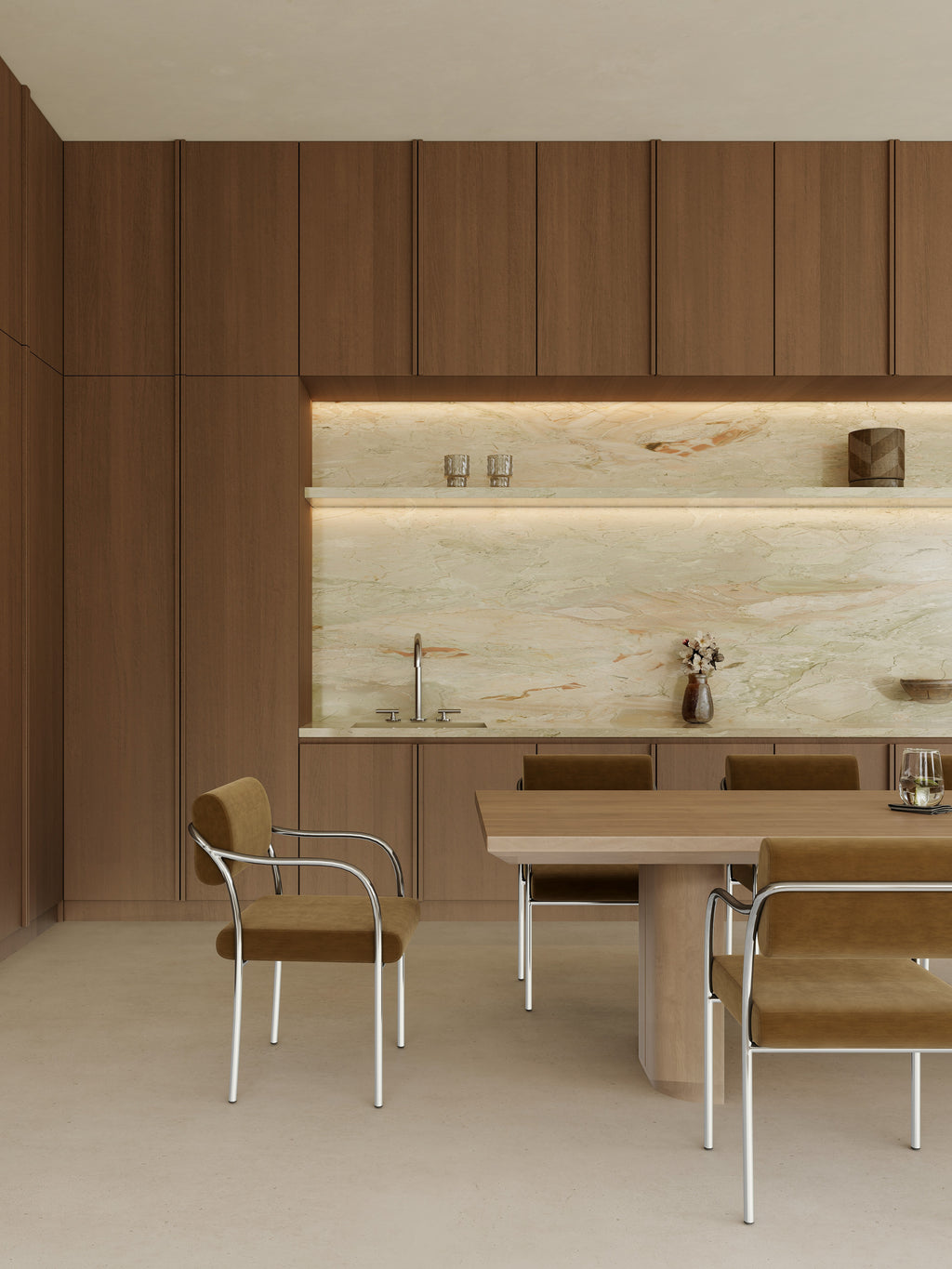 Modern kitchen with wooden cabinets, marble backsplash, and dining table.
