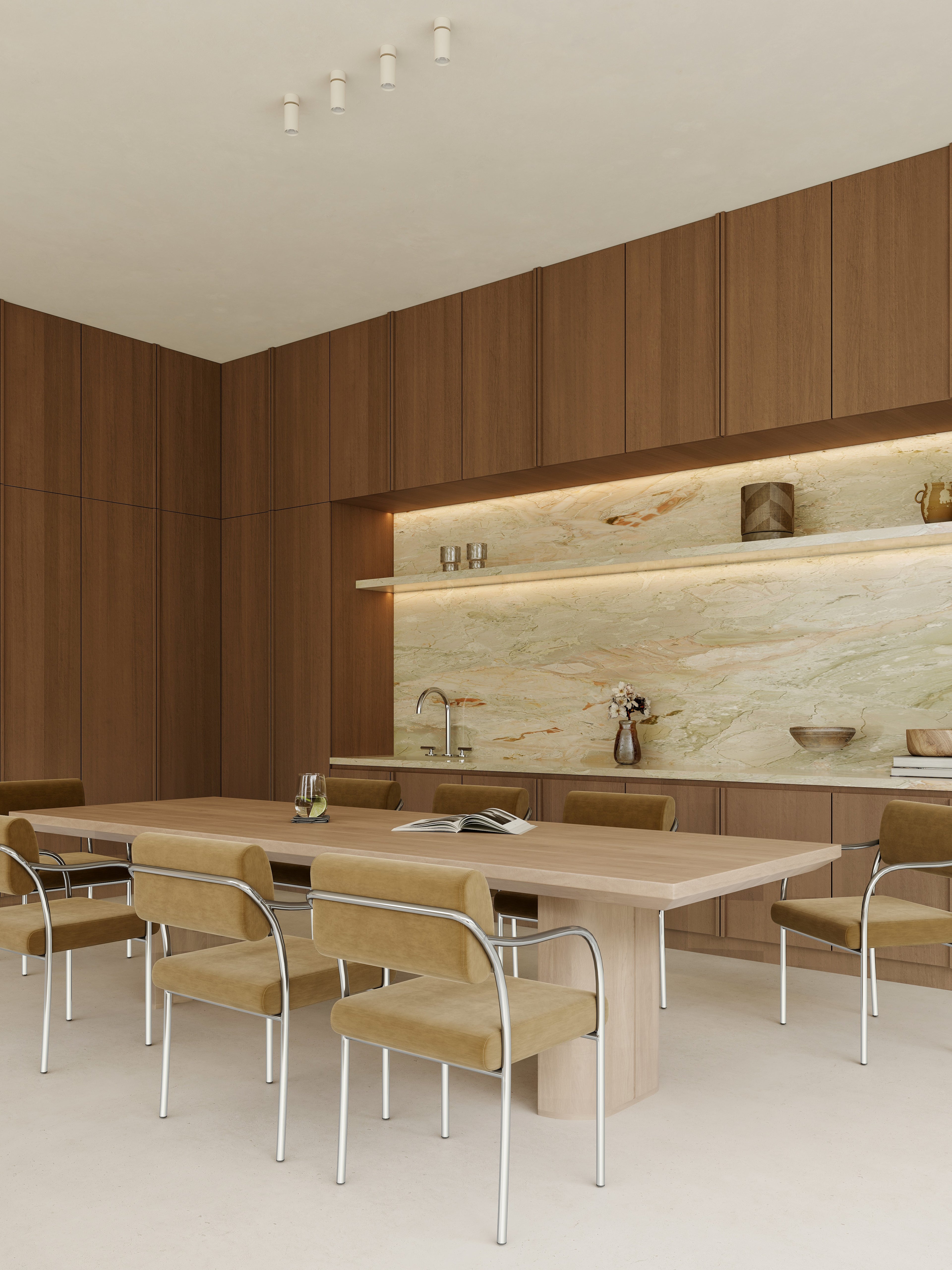 Modern kitchen with wooden cabinets, marble backsplash, and dining table.