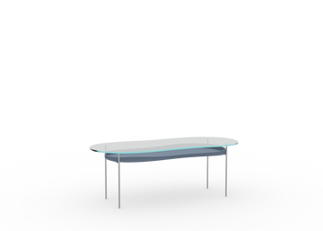 A minimalist design table with a clear glass tabletop and a metallic frame, likely on a white background.