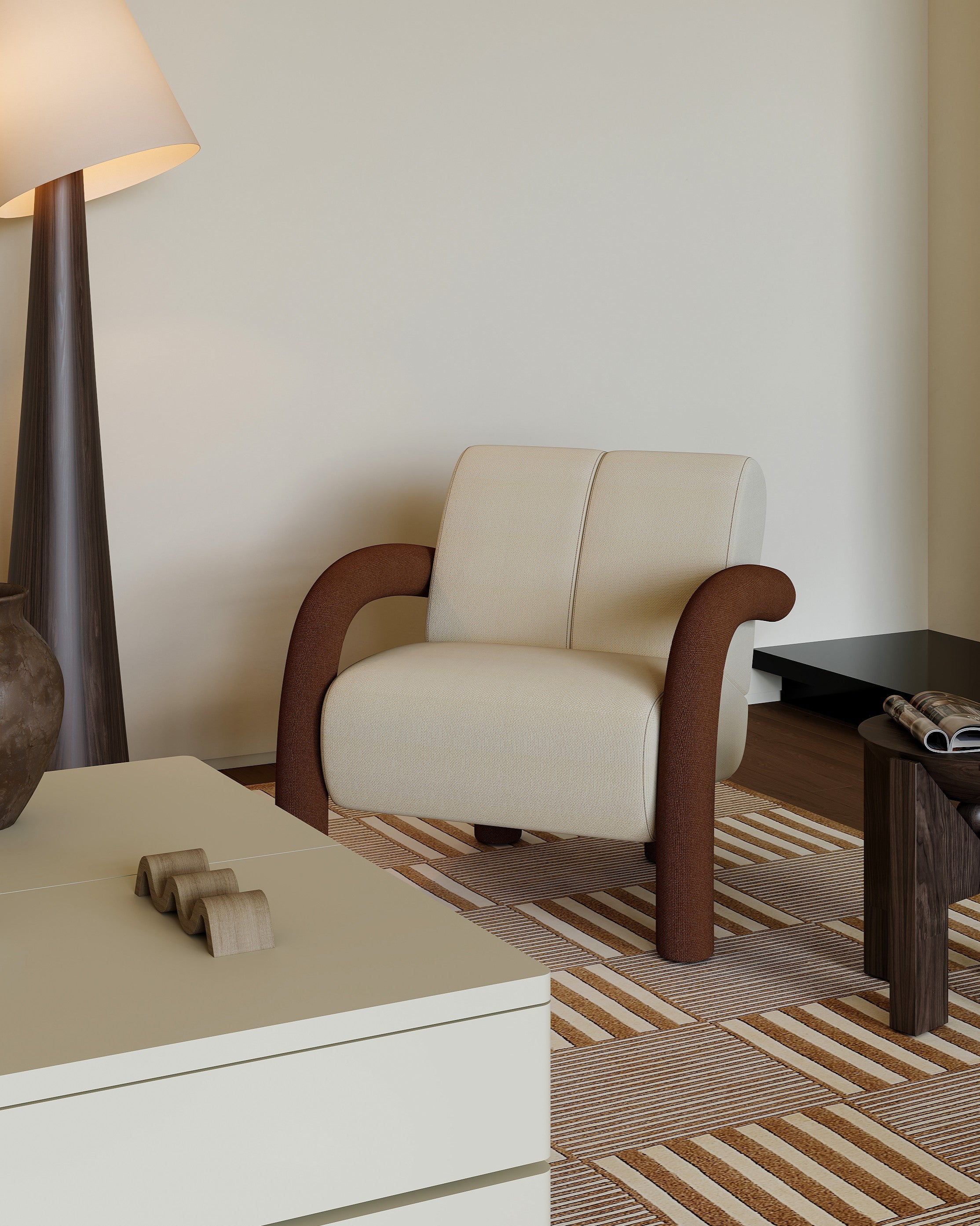 Beige armchair in a modern living room with a lamp and coffee table.